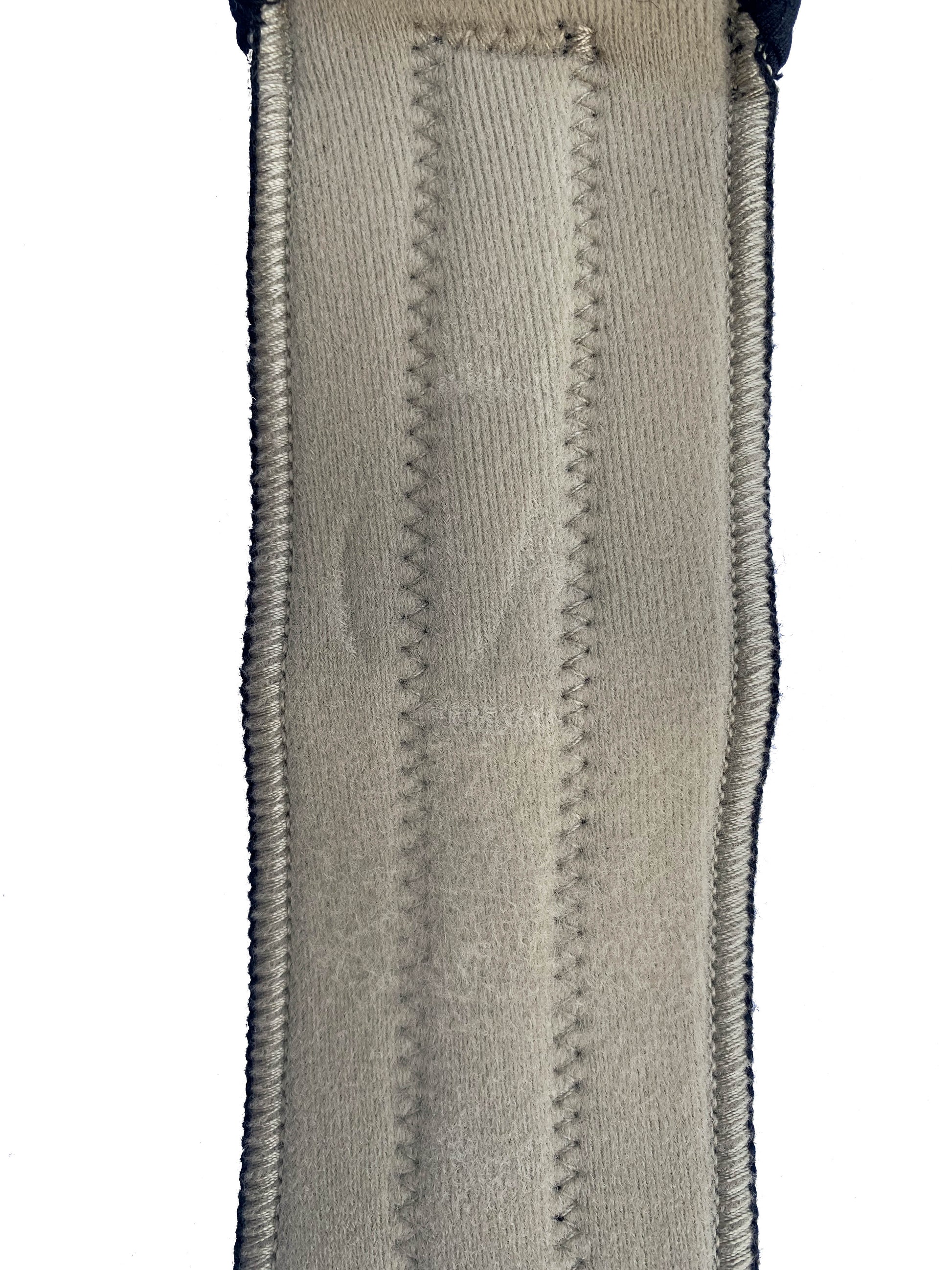 Up close shot of the beige BioMagnetic Wrist Support showing the quality stitching and fabric of the support.