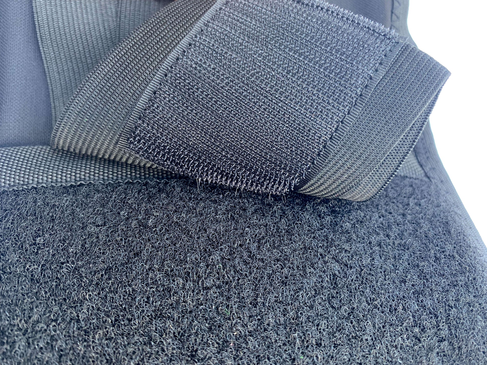 A close up of one of the adhesive closures used on the Bio Magnetic Back Support for the best support.