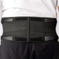 Middle aged man wearing a black biomagnetic Back Support with triple adhesive closure, vented sides and supportive back with 20 therapeutic magnets.