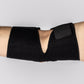 Inside of the elbow view of the Bio Magnetic Elbow Support Brace on a man's arm in black. 