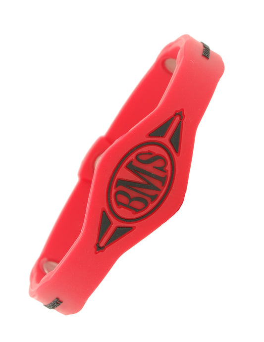 The Bio Magnetic Bracelet in red, featuring a BMS symbol in black. 