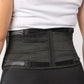 Woman wearing the Bio Magnetic Back Support Brace from the rear view showing the supportive stays that cover the 20 therapeutic magnets.
